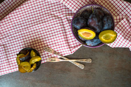 Sweet plum dessert with cinnamon in vintage styleの写真素材