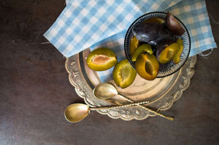 Sweet plum dessert with cinnamon in vintage styleの写真素材