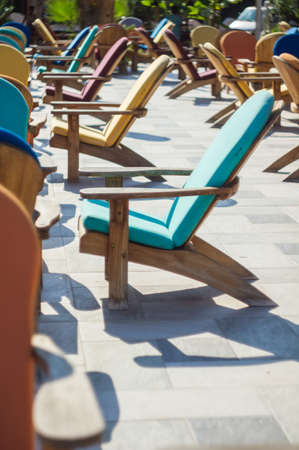 Wooden sun chair on outdoor deck cafe overlooking the Mediterranean Seaの写真素材