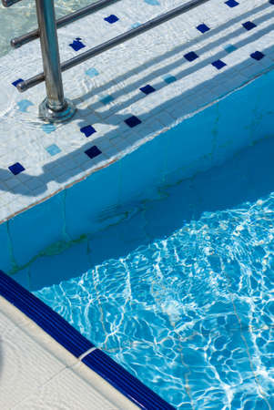 Blue swimming pool rippled water detailの写真素材