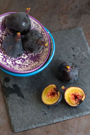 Ripe fig fruits on the dark vintage  background. Selective focusの写真素材