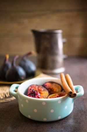 Ripe fig fruits on the dark vintage background. Selective focusの写真素材