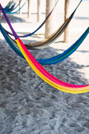 Travel concept with a hammock in a tropical beachの写真素材