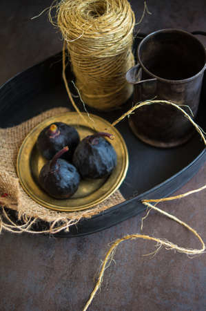 Ripe fig fruits on the dark vintage background. Selective focusの写真素材