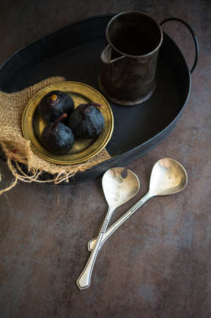 Ripe fig fruits on the dark vintage background. Selective focusの写真素材