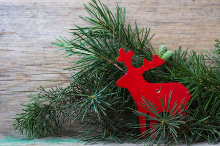 Christmas decorations on the old rustic wooden backgroundの写真素材