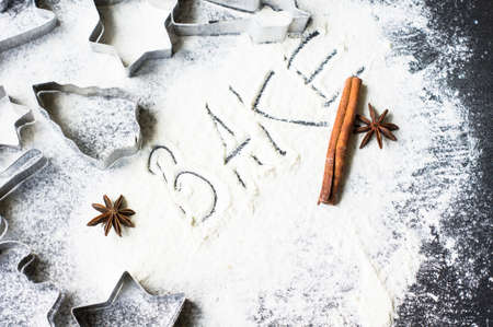 Holiday Cookie Cutters on Rustic black stone backgroundの写真素材