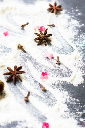 Christmas tree with the flour, cinnamon and anise star spices as a decoration (homemade baking)の写真素材