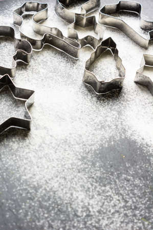 Holiday Cookie Cutters on Rustic black stone backgroundの写真素材