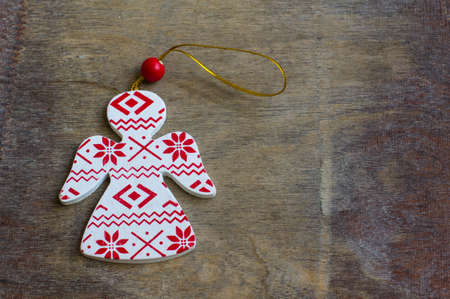 Christmas time decorations of angels  on the rustic backgroundの写真素材