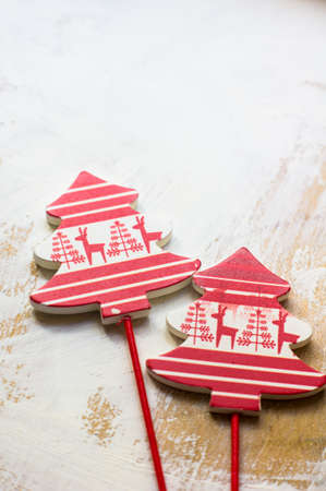 Decorations for Christmas time interior on the old white wooden tableの写真素材