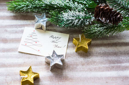Christmas time interior decorations on the rustic background with gingerbread and christmas candy