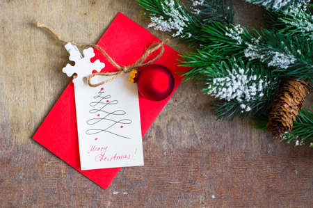 Christmas time interior decorations on the rustic background with candle lamp and fir tree