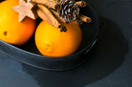 Ripe orange fruits on the vintage trayの写真素材