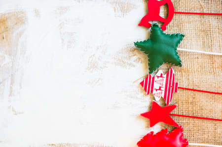 Different colors Christmas decorations on rustic backgroundの写真素材