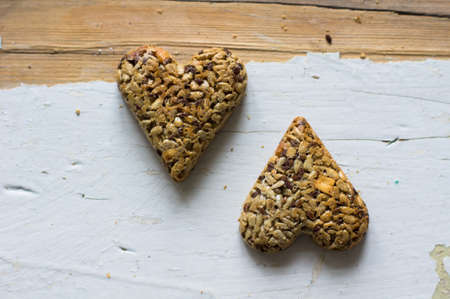Eastern sweets: heart shaped baklava with the nuts, closeup of eastern sweet dessertの写真素材