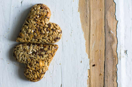 Eastern sweets: heart shaped baklava with the nuts, closeup of eastern sweet dessertの写真素材