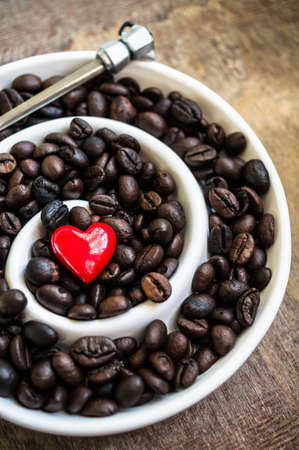 Coffee beans on rustic background