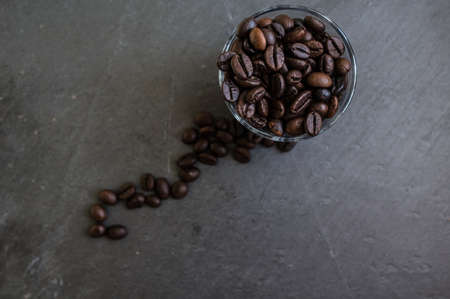 Coffee beans on rustic background