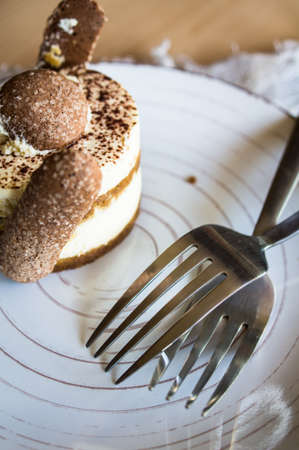 traditional european dessert on vintage porcelain plate onn rustic table