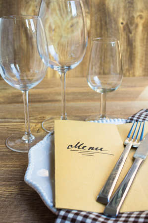 Table setting in rustic style with Menuの写真素材