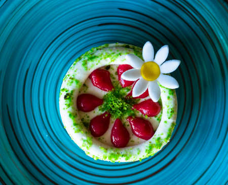 traditional european dessert on vintage porcelain plate onn rustic table