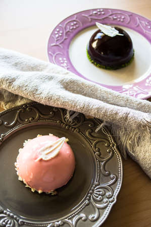 traditional european dessert on vintage porcelain plate onn rustic table