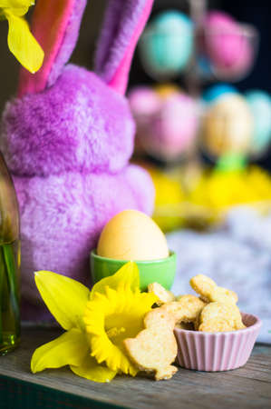 Rustic easter holiday concept with easter bunny and eggs