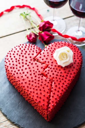 Red heat shaped chocolate cake for St. Valentines Day celebrationの写真素材