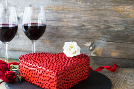 Red heat shaped chocolate cake for St. Valentines Day celebrationの写真素材