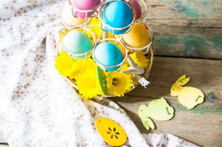 Rustic easter holiday concept with easter bunny and eggs