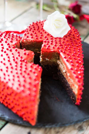 Red heat shaped chocolate cake for St. Valentines Day celebration