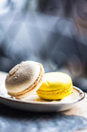 Traditional french dessert macaroons on the plateの写真素材