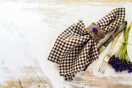 Elegant spring table setting with delicate  muscari flowers. Selective focus