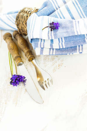 Elegant spring table setting with delicate  muscari flowers. Selective focusの写真素材