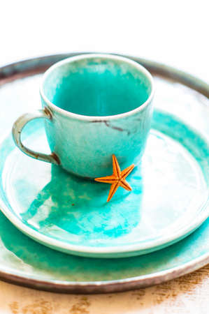 Summer table setting on marine theme. Selective focus