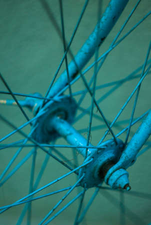 Details of vintage blue bicycle wheel