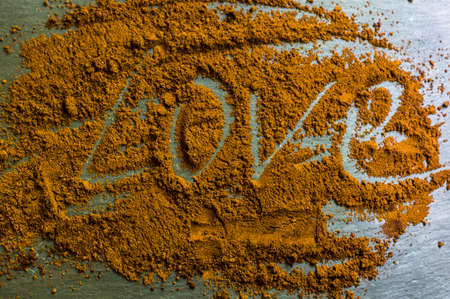 Love with dusting coffee on rustic wooden backgroundの写真素材