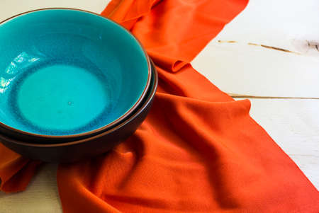 Rustic table setting with vintage silverware ad plates on old styled napkinsの写真素材