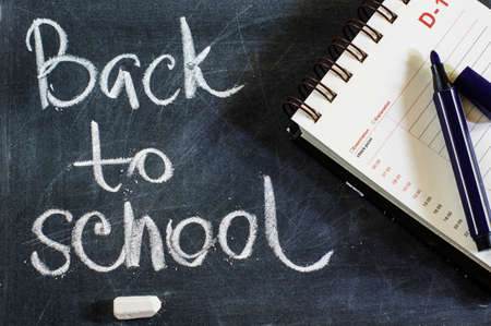Back to school concept with chalkboard