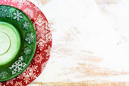 Christmas time table setting with vintage silverware on plate and napkinの写真素材