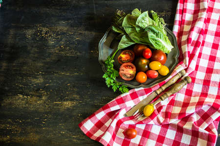 Ingredients for summer salad - romano salad, tomatoes, parsley etc.の写真素材