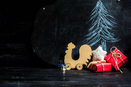Christmas time decoration concept on dark wooden table with copyspaceの写真素材