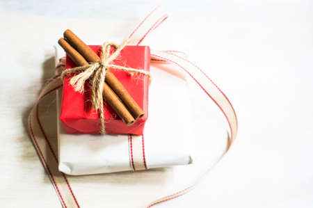 Christmas gifts in rustic style with holiday decorations, selective focusの写真素材