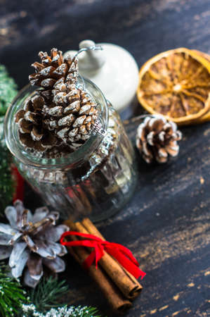 Christmas cookies pine cone shaped with festive decorationの写真素材