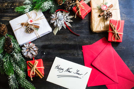 Christmas presents in rustic style with holiday decorations, selective focusの写真素材