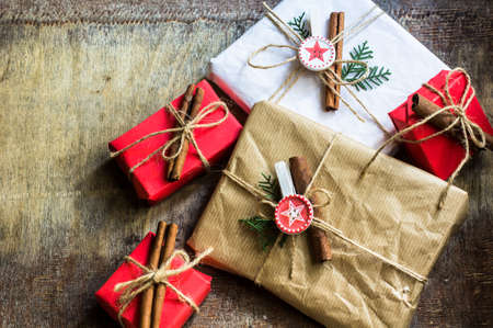 Christmas presents in rustic style with holiday decorations, selective focusの写真素材