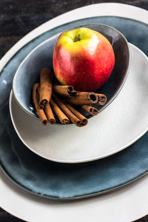 Fresh organic apple on dark wooden table with copyspaceの写真素材