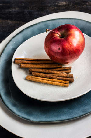 Fresh organic apple on dark wooden table with copyspaceの写真素材