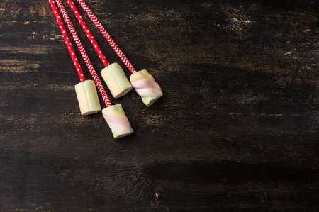 Christmas or New Year composition with hot chocolate and marshmallows, decorated with fir cones and...